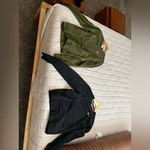 Nike. 2 sweatshirts